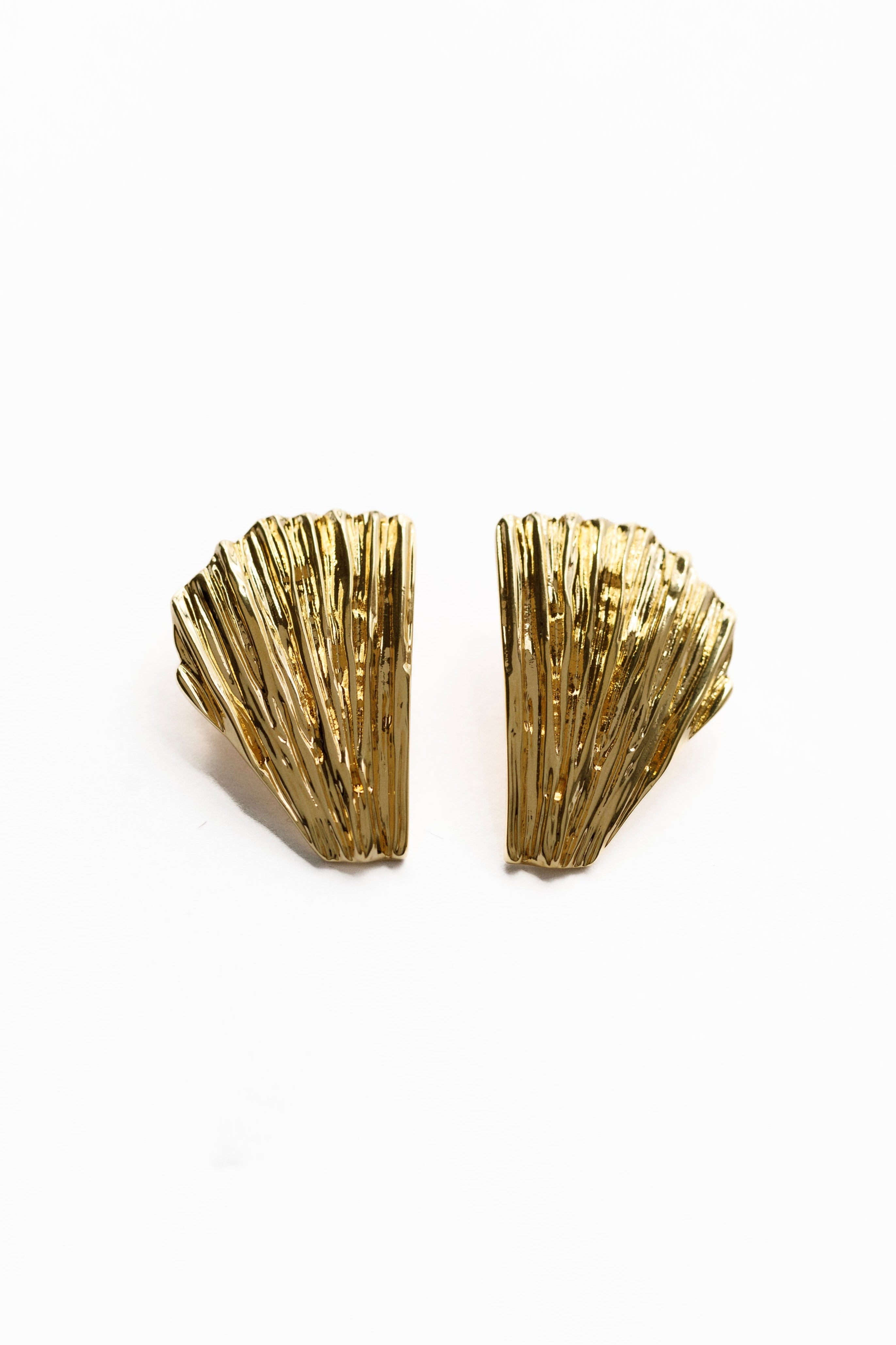 Pair of gold shell-shaped earrings on a white background ,Neréa Earrings - demnéa